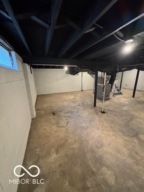 basement featuring heating unit