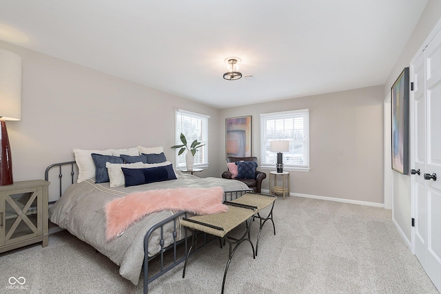 bedroom featuring light colored carpet