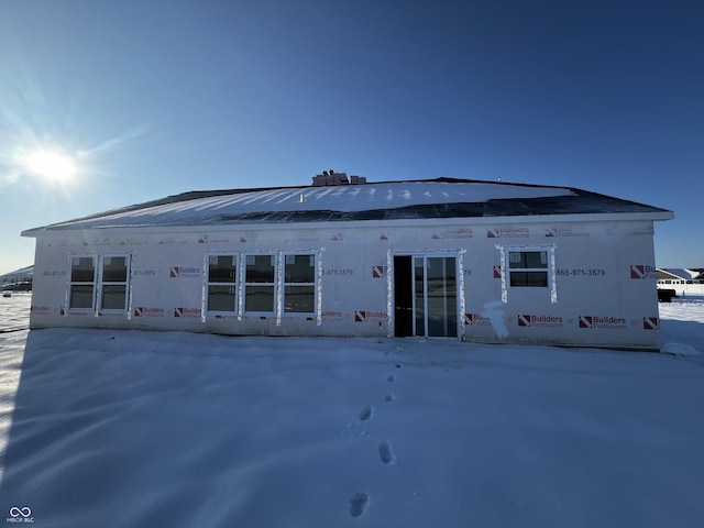 view of snow covered property