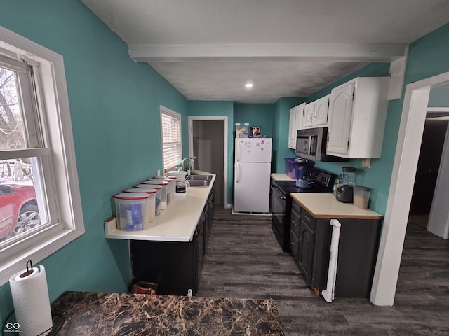 kitchen with sink, black electric range oven, beamed ceiling, white cabinets, and white refrigerator