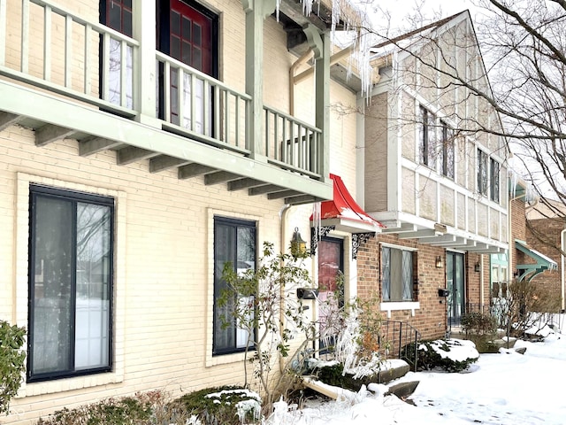 view of snow covered property