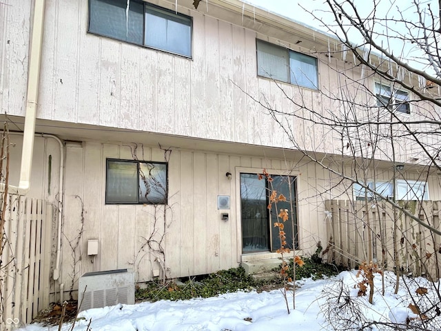 view of snow covered property