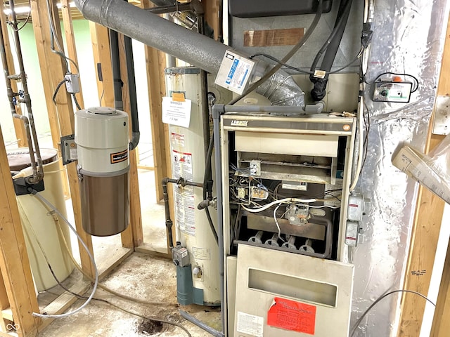 utility room featuring heating unit