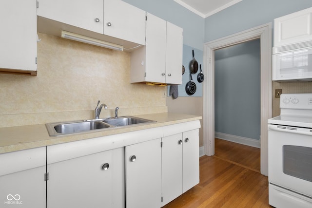 kitchen with white cabinetry, tasteful backsplash, white appliances, light hardwood / wood-style flooring, and sink