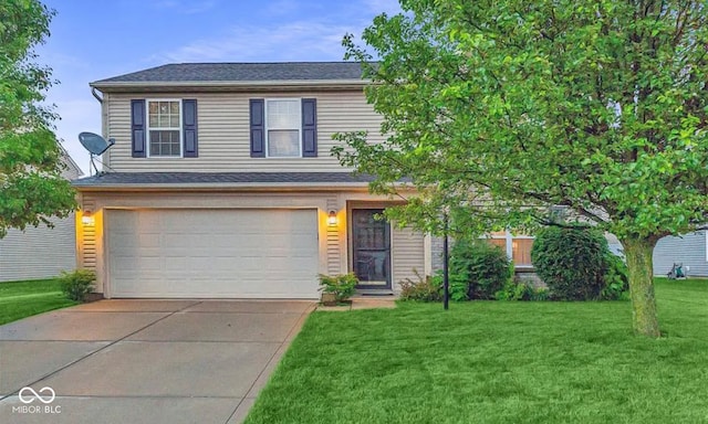 view of front of home with a garage and a front yard