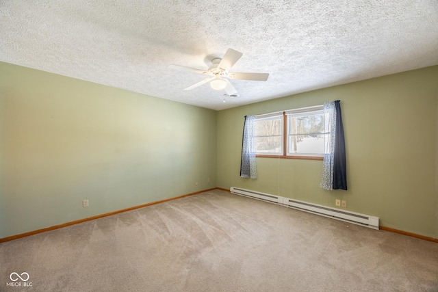 spare room featuring carpet floors, ceiling fan, a baseboard heating unit, and a textured ceiling