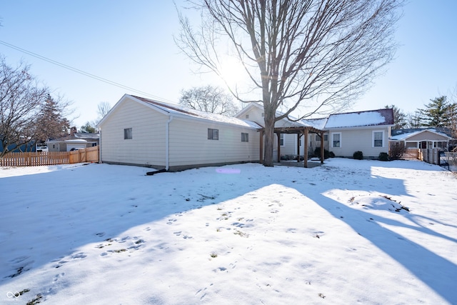 view of snow covered property