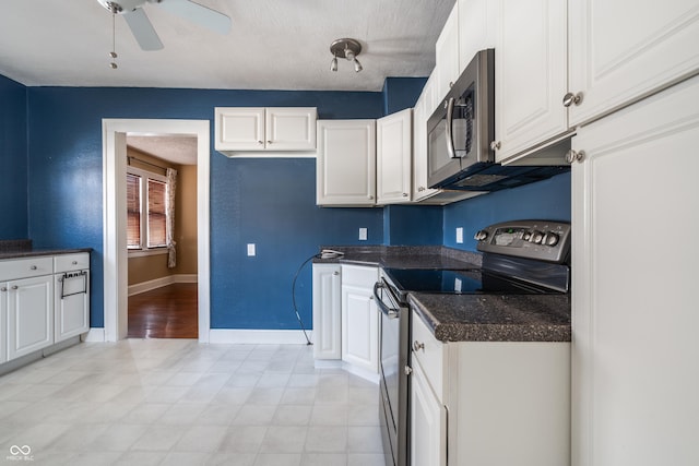 kitchen featuring a textured ceiling, ceiling fan, white cabinetry, and stainless steel electric stove