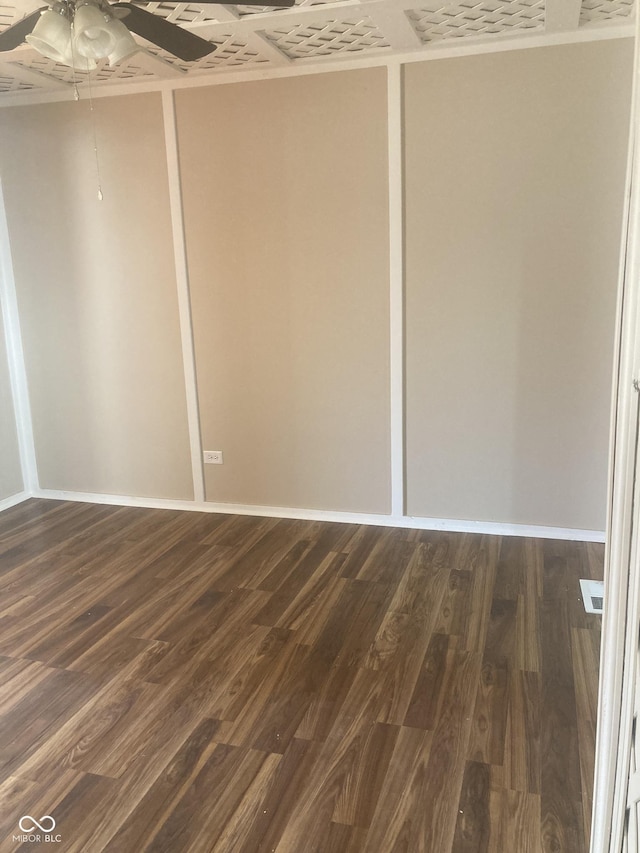 interior space with ceiling fan and dark wood-type flooring