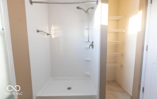 bathroom with walk in shower