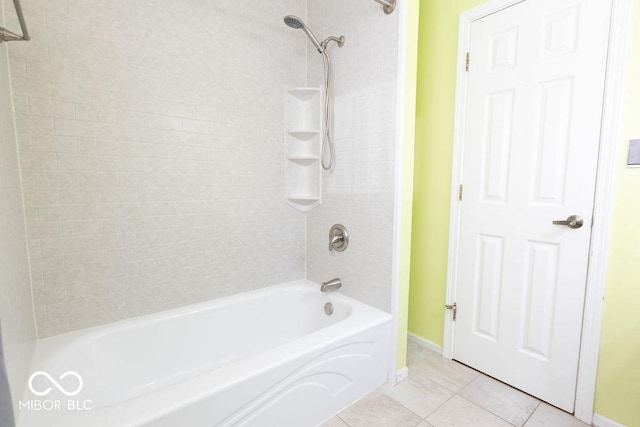 bathroom featuring tile patterned flooring and shower / bathing tub combination