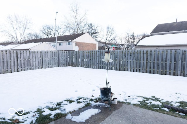 view of snowy yard