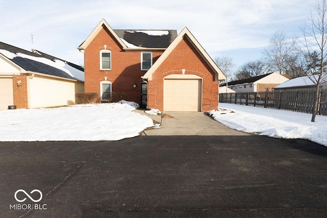 front of property featuring a garage