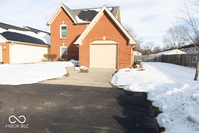 front of property with a garage