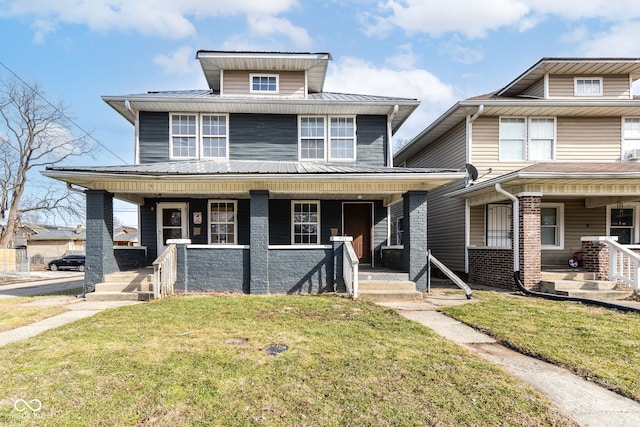 view of front of property featuring a porch and a front yard