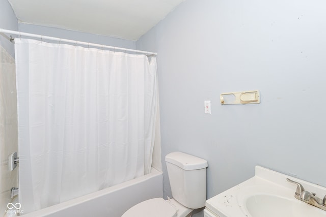 full bathroom featuring vanity, toilet, and shower / bathtub combination with curtain