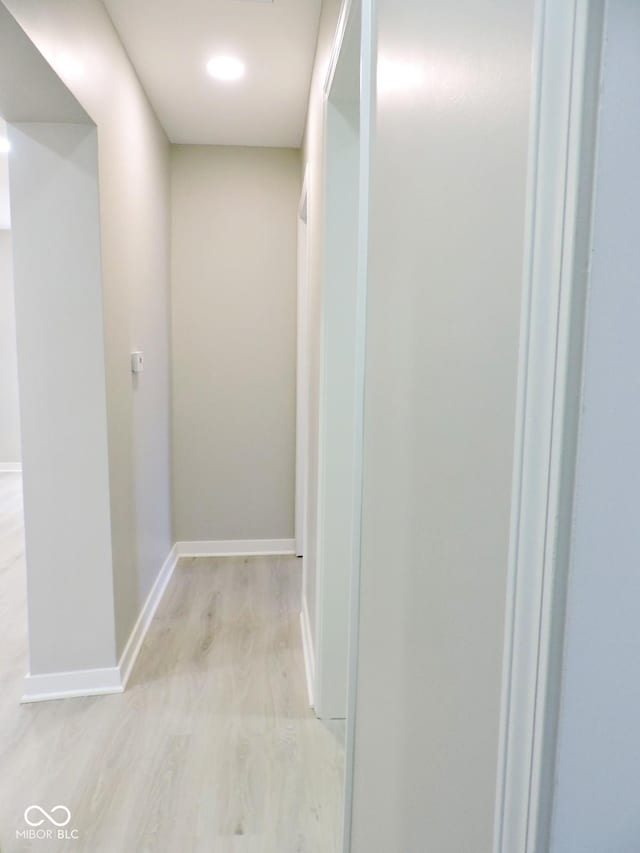 hallway featuring light hardwood / wood-style flooring