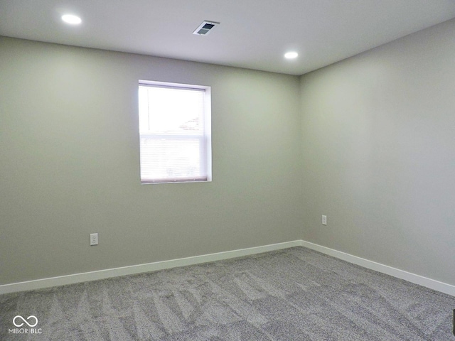 spare room with carpet flooring