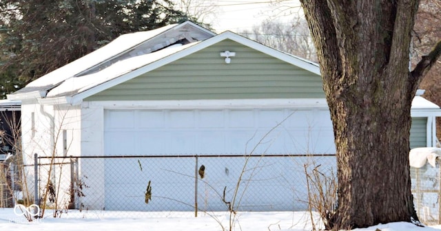 view of snow covered garage