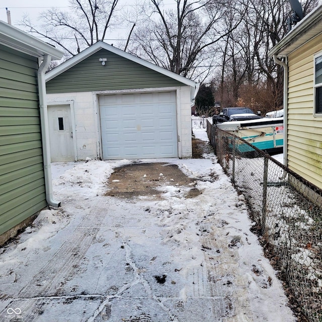 view of snow covered garage