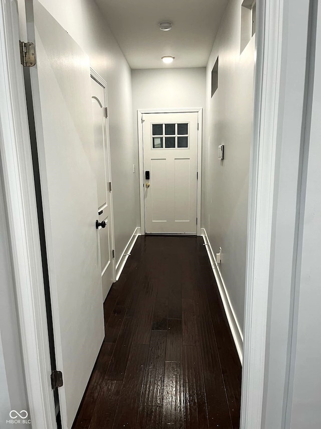 doorway featuring dark hardwood / wood-style flooring