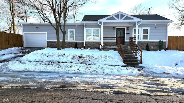 view of front of home with a garage