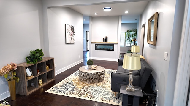 living room featuring dark wood-type flooring