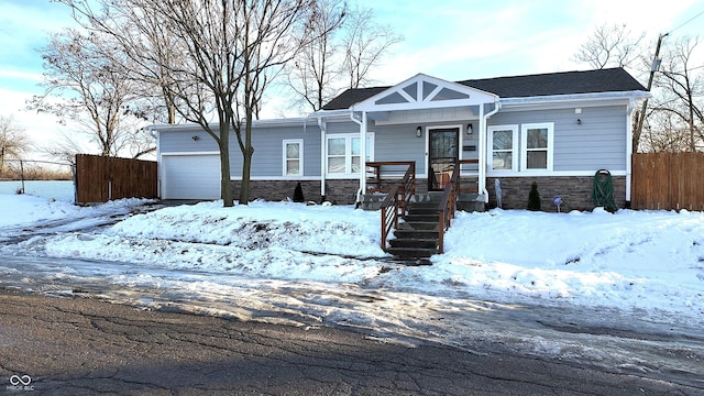 view of front of property featuring a garage