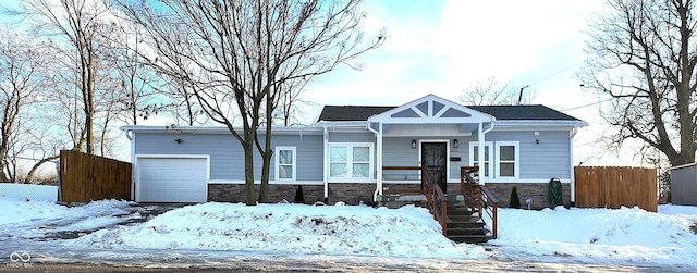 view of front of property featuring a garage