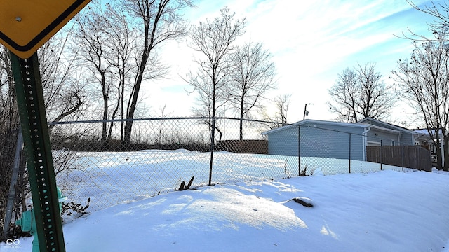 view of yard covered in snow