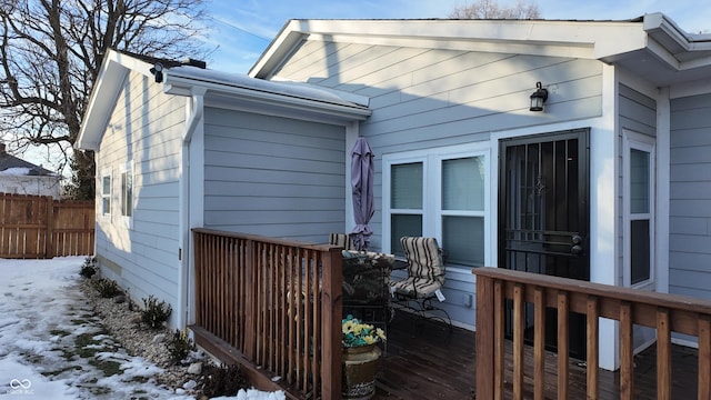 view of snow covered deck