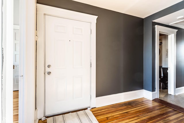 interior space with dark hardwood / wood-style floors