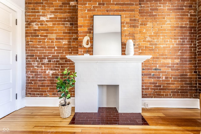 interior details featuring hardwood / wood-style flooring