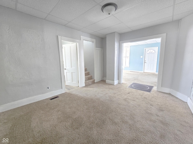 unfurnished living room featuring carpet flooring