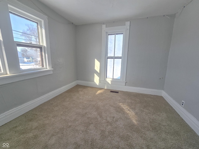 empty room featuring carpet floors