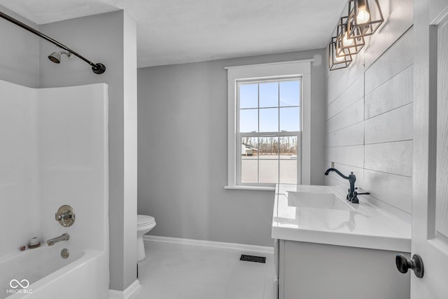 full bathroom featuring toilet, shower / bath combination, and vanity