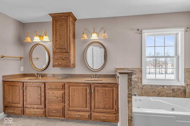 bathroom with vanity and a bathing tub