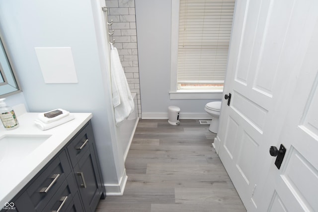 full bathroom with shower / bathtub combination, toilet, and vanity