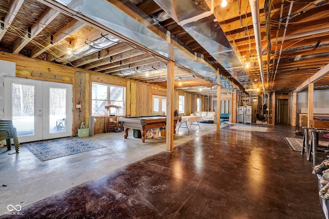 rec room with billiards, french doors, and concrete flooring