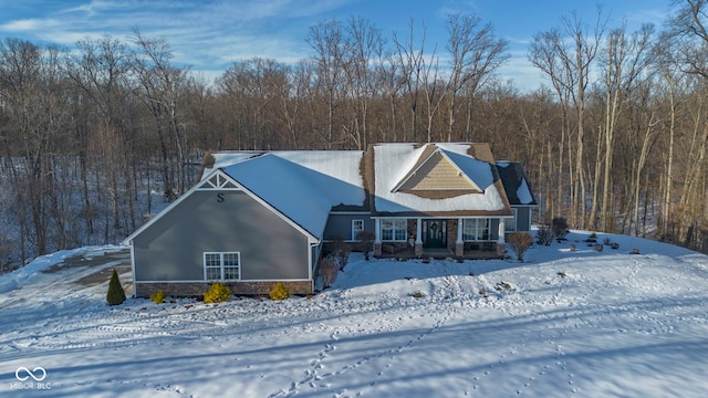 view of snow covered property