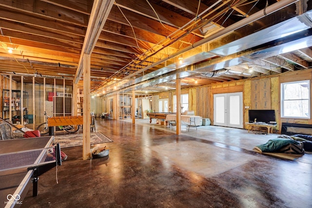 basement featuring french doors and pool table