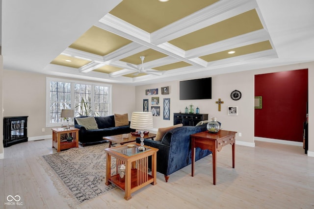 living room featuring ceiling fan, beamed ceiling, crown molding, coffered ceiling, and light hardwood / wood-style flooring