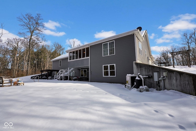 view of snow covered property