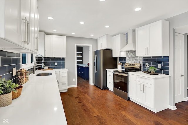 kitchen with white cabinetry, stainless steel appliances, dark wood-type flooring, custom range hood, and sink