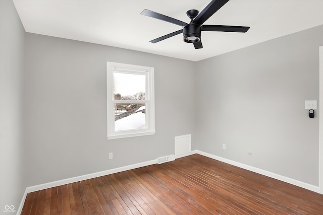 empty room featuring ceiling fan and wood-type flooring