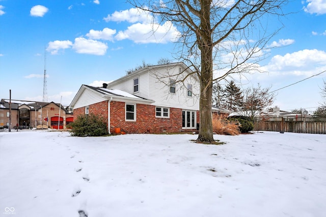 view of snow covered property