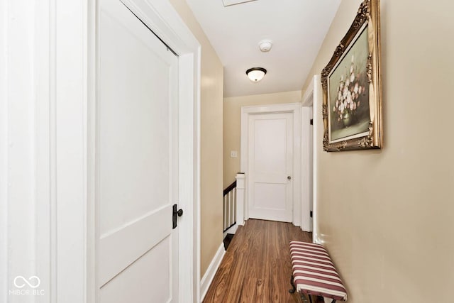 corridor featuring dark hardwood / wood-style floors