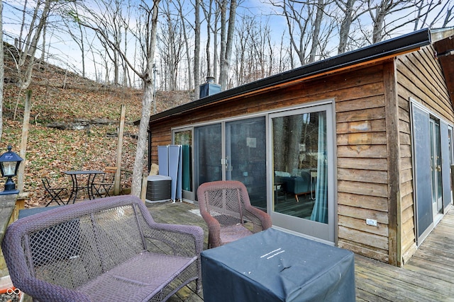 wooden deck featuring central AC