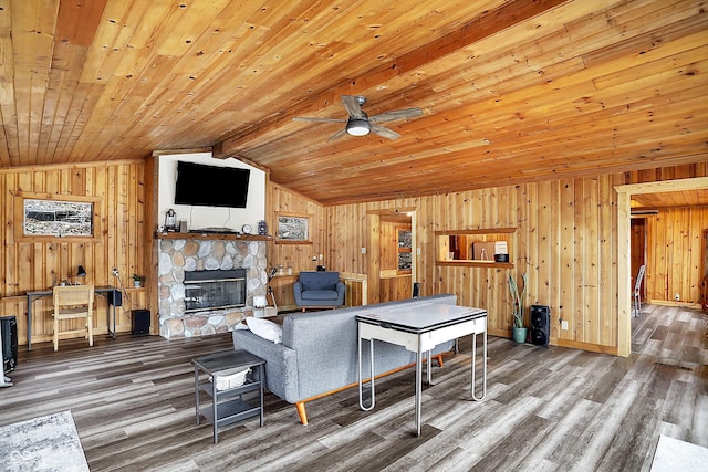 living room with lofted ceiling with beams, wood-type flooring, wood ceiling, and a fireplace