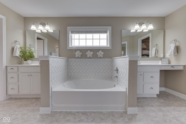 bathroom featuring a bath and vanity